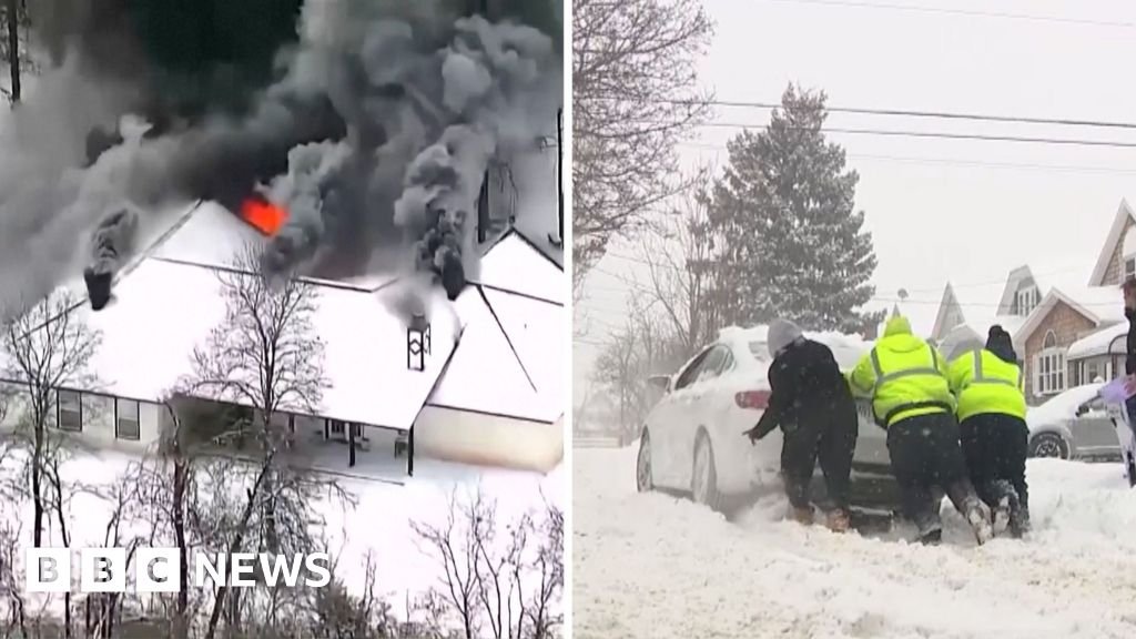 Damaged homes and roadways as deadly winter storm hits US