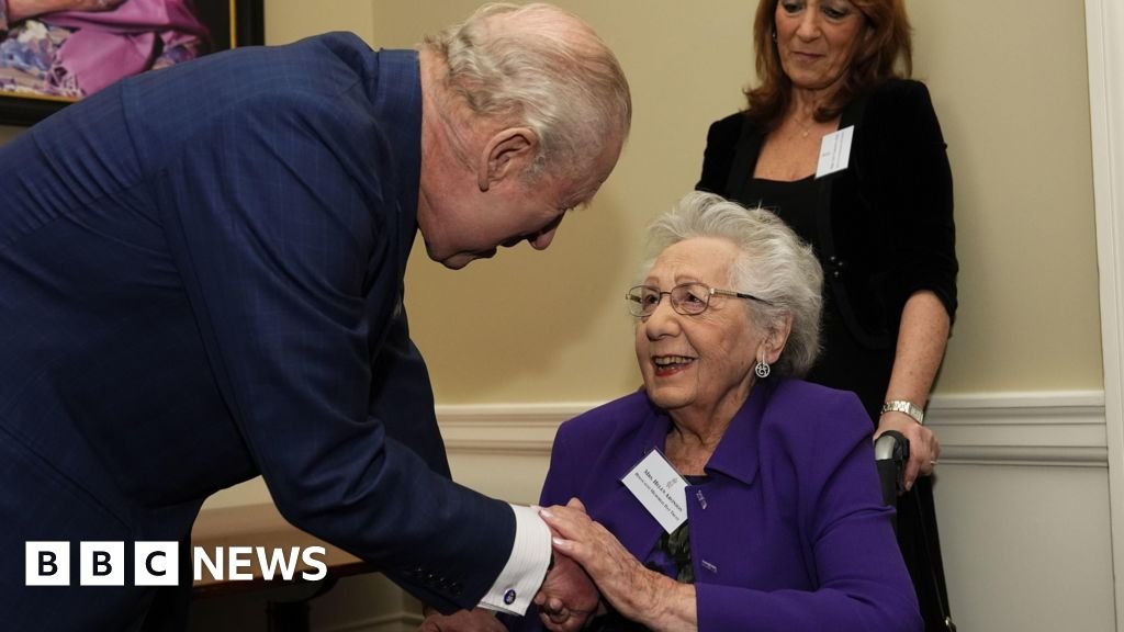 King and Queen meet Holocaust survivors at Buckingham Palace